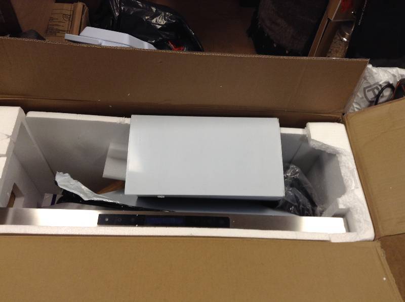 lot 51 image: AKDY 36 in. Convertible Kitchen Wall Mount Range Hood in Stainless Steel with Remote, Touch Control and Carbon Filter open box never used