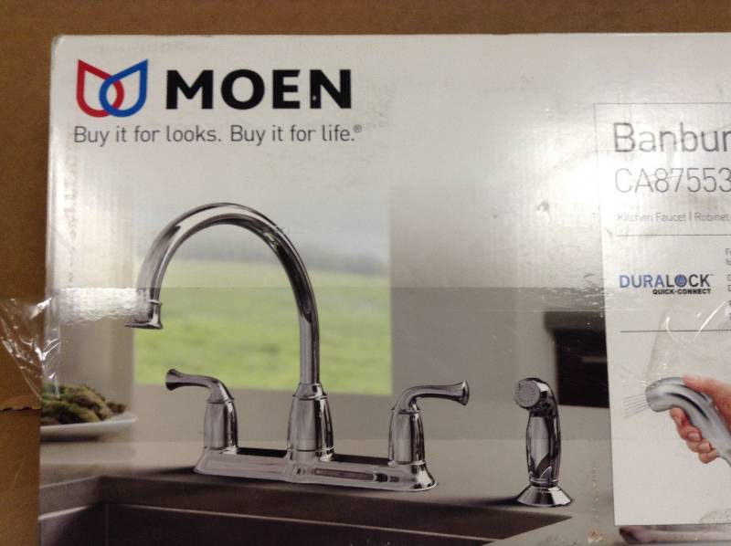 lot 63 image: MOEN Banbury 2-Handle Mid-Arc Standard Kitchen Faucet with Side Sprayer in Chrome Model#  CA87553