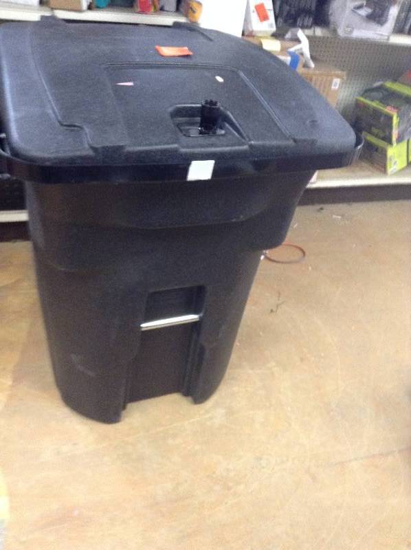 lot 17 image: Toter 96-Gal. Black Bear-Tight Wheeled Trash Can - Bear-tight lock and steel-reinforced rim and latch to prevent bears from opening the lid and feeding on your garbage Retails for $229