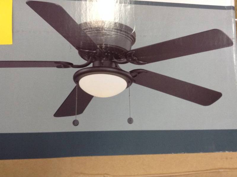 lot 83 image: Hampton Bay Hugger 52 In. Black Ceiling Fan With Light Kit 704 543 open box never used