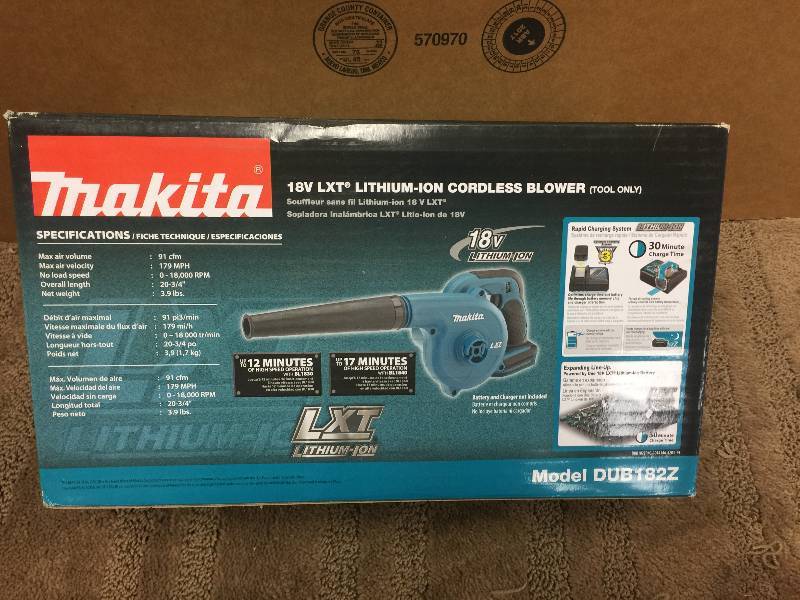 lot 133 image: Makita 179-MPH 91-CFM 18-Volt LXT Lithium-Ion Cordless Blower (Tool-Only) Model#  DUB182Z open box never used