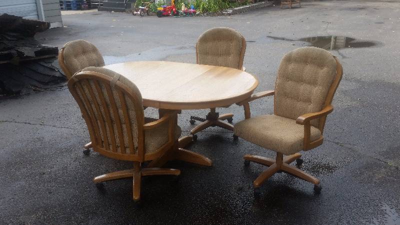 lot 47 image: Kitchen Table (42 Inch Round) Includes 18 Inch Leaf & 4-Padded Swivel Chairs