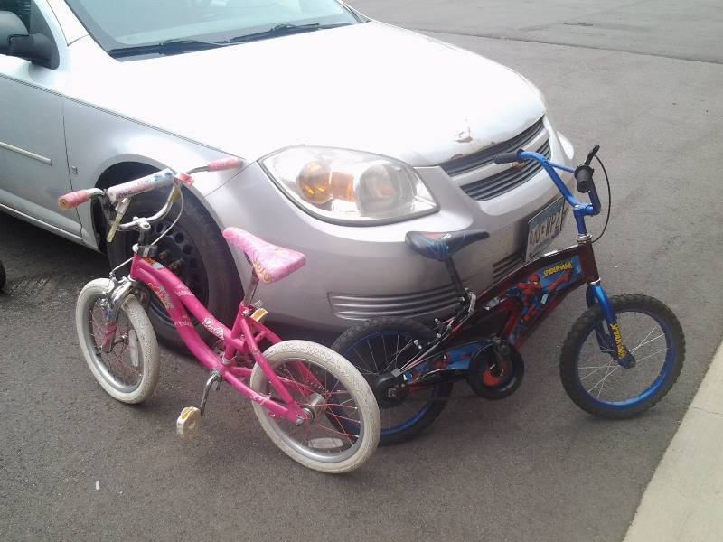lot 6 image: Spiderman & Barbie 16 Inch Bikes Both Need Repair