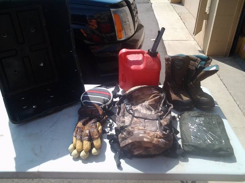 lot 36 image: Boots Size 9 12, Back Pack, Gloves Rain Suit, Gas Can