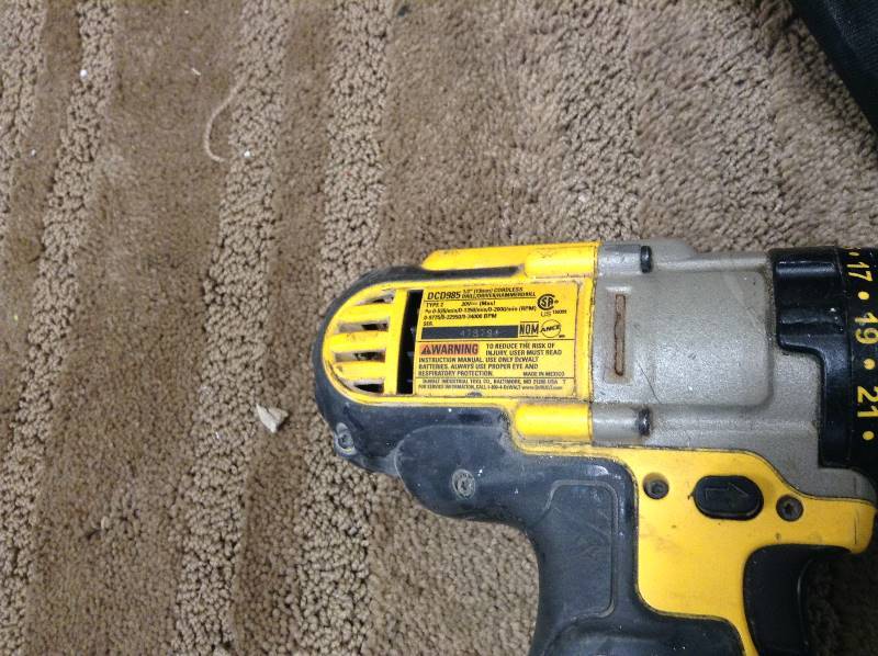 Dewalt Hamer Drill and Impact Drill Set used in working conditions