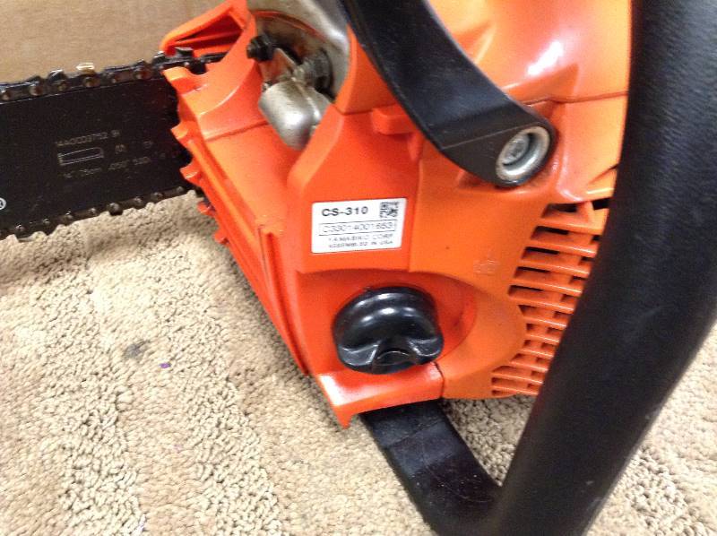 ECHO 14 in. 30.5cc Gas Chainsaw in working conditions