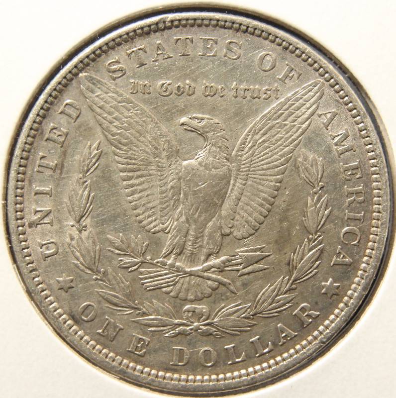 1879 MORGAN SILVER DOLLAR AU
