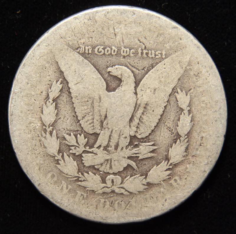 1883 MORGAN SILVER DOLLAR IN LOW GRADE