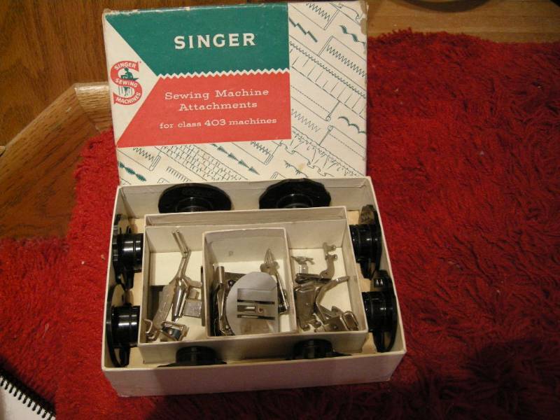 lot 176 image: Singer 403 attachments