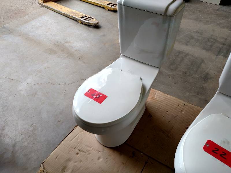lot 23 image: Sterling Dual Flush Toilet, Recentl...