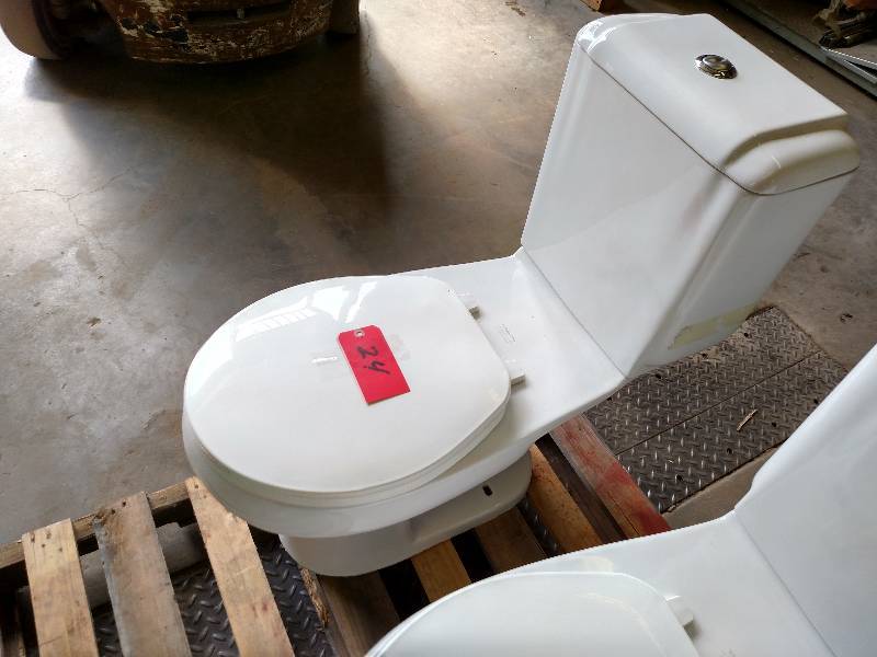 lot 24 image: Sterling Dual Flush Toilet, Recentl...