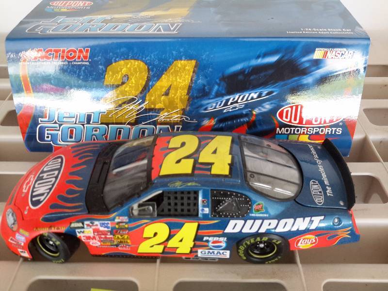 lot 34 image: Jeff Gordon No 24 Stock Car, Jeff Gordon Miniature to scale Helmet