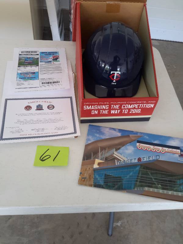 lot 61 image: Construction Helmet from Target Field, Target Field Calendar, other collectibles as shown