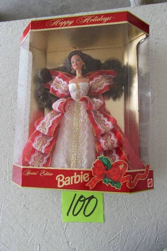 lot 100 image: Collectible Barbie as shown..