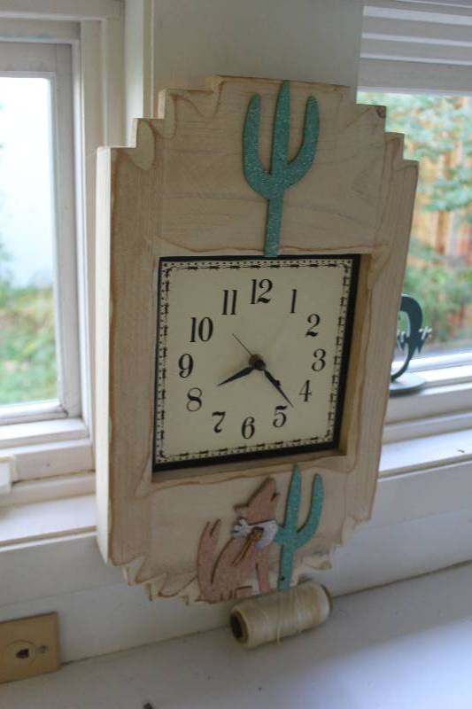 lot 78 image: Southwest Cactus Wall Clock