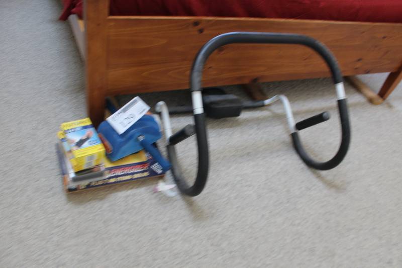 lot 129 image: Ab Roller Exercise Equipment & Futuro Hand Braces