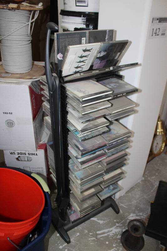 lot 142 image: CDs & Rotating CD Tower