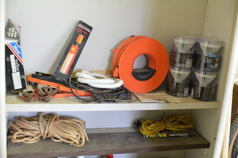 lot 268 image: Locking Cabinet w Keys Contents Included LED Lights, Rope, Extension Cords