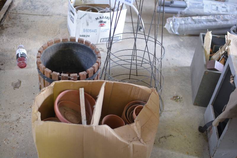 lot 305 image: Gardening Supplies Includes Pots, Stakes, Planters, And More