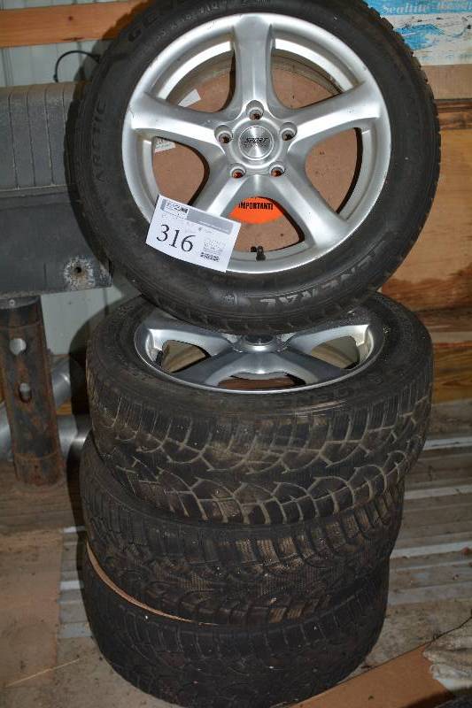 lot 316 image: Lot of (4) P20555R16 Snow Tires w 16in. Wheels