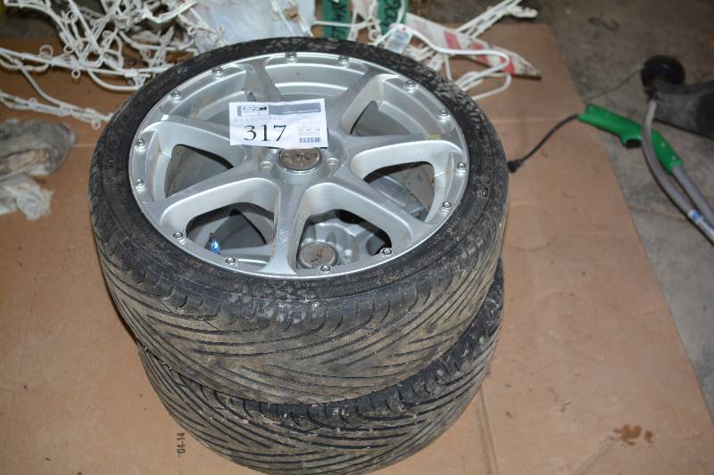 lot 317 image: Lot of (2) P21540ZR17 Tires w 17in. Wheels