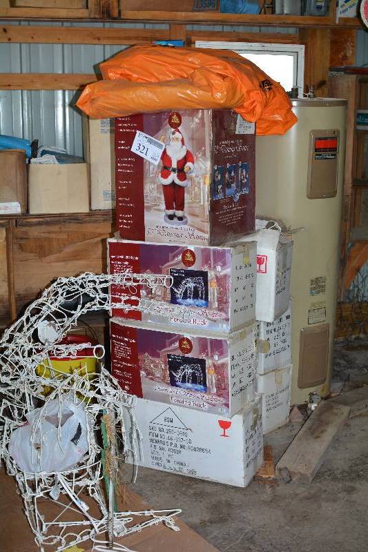 lot 321 image: Lot of (10) Boxes of Christmas Figurines - Animated Wire Sculpture Feeding Buck, Dancing Santa, And More In Original Boxes
