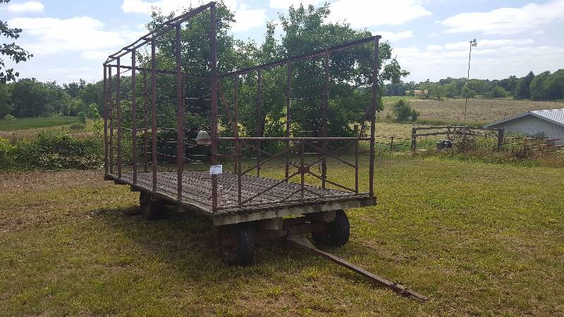 lot 22 image: Kicker Style Hay Rack, 2-Axle 4-Wheel Pull-Behind Trailer w Wood Deck, Metal Post Sides
