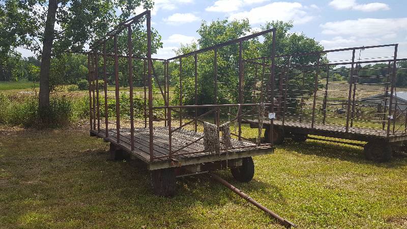 lot 23 image: Kicker Style Hay Rack, 2-Axle 4-Wheel Pull-Behind Trailer w Wood Deck, Metal Post Sides
