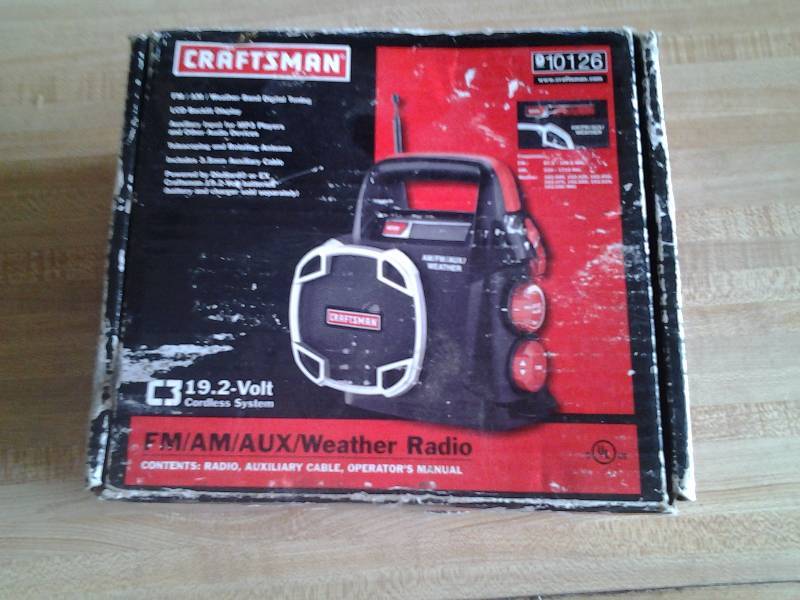 lot 5 image: New Craftsman 19.2 Volt AMFMAux Weather  Radio