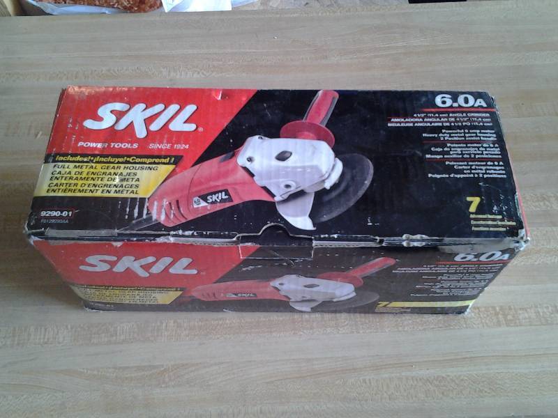lot 8 image: New Skil 4 12 Inch Angle Grinder