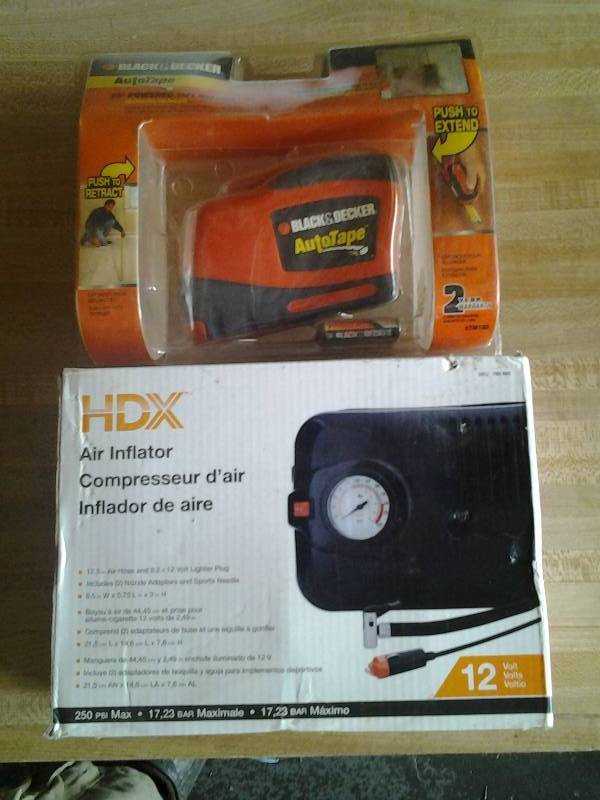 lot 16 image: New Black & Decker Electric Tape Measure & HDX 12 Volt Air Compressor