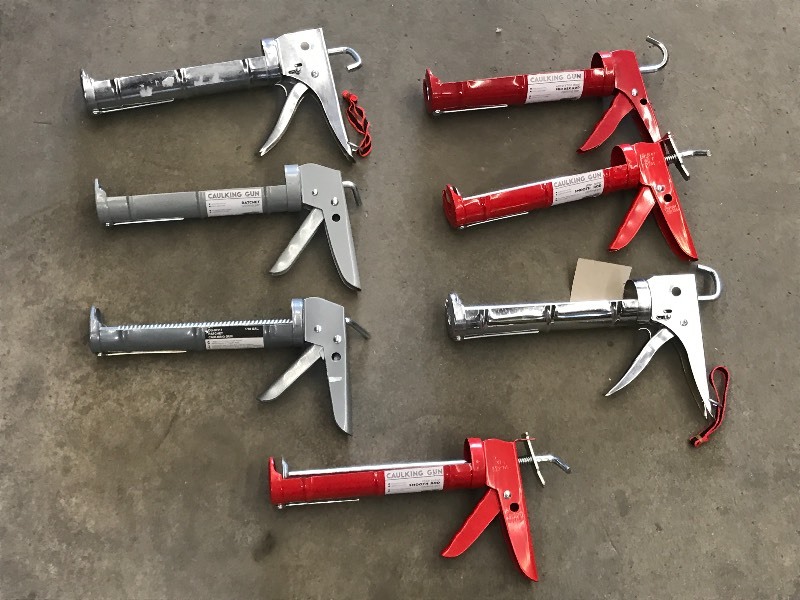 Lot Of (7) New Caulk Guns ...