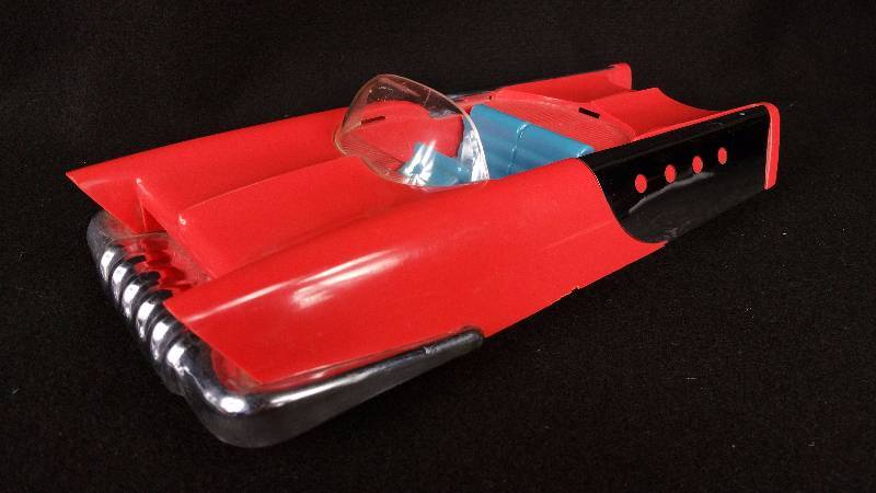 lot 55 image: 1950s Mattel Futuristic Car w Fly Wheel Motor