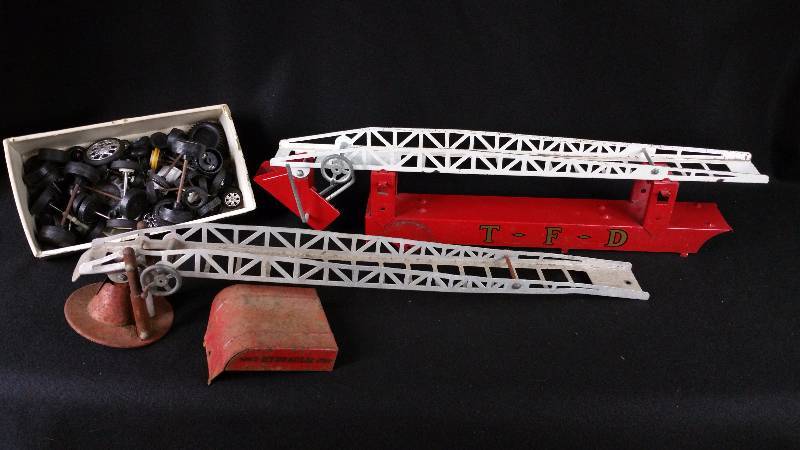 lot 57 image: Tonka Firetruck Aerial Ladders & Wheels Parts Lot