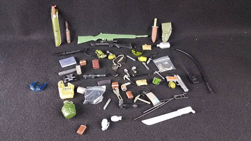 lot 70 image: Group of 12 G I Joe Accessories