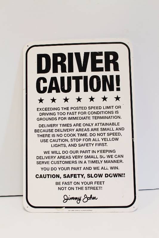 lot 43 image: Driver Caution Jimmy Johns Porcelain Sign