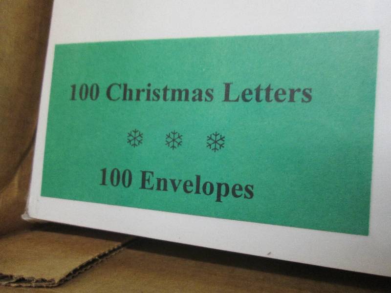 lot 63 image: 6 Pkgs of 100 Christmas Greeting Pa...