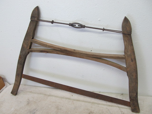 lot 8 image: Antique Buck Saw