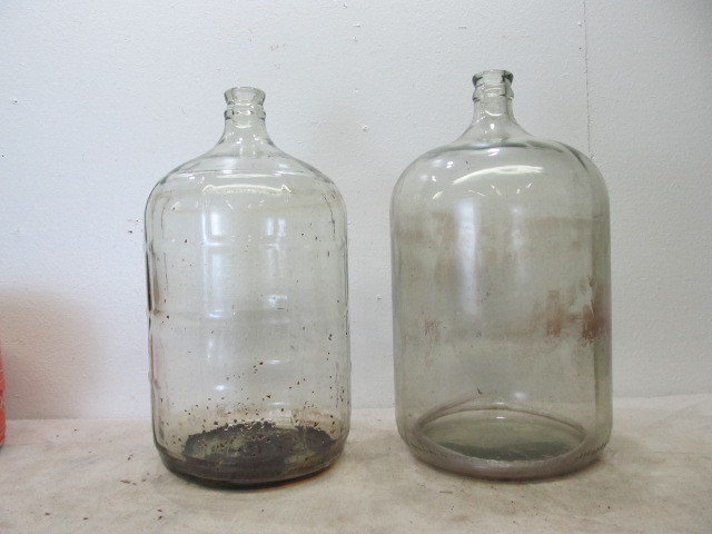 lot 108 image: 2 Vintage 5 Gallon Glass Jugs