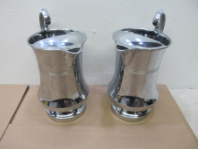 lot 131 image: Matching Pair of Vintage FARBERWARE Silverplated Pitchers