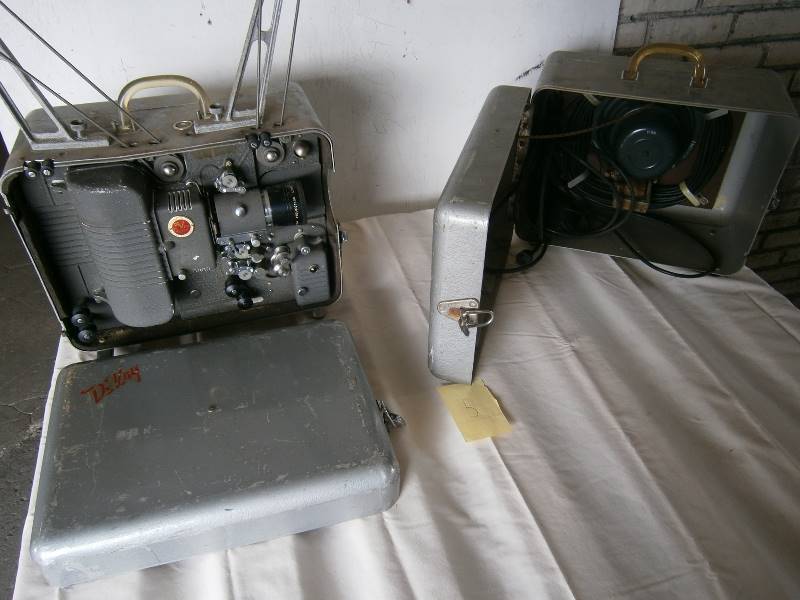 lot 154 image: Vintage Devry Movie Projector wPortable Speaker