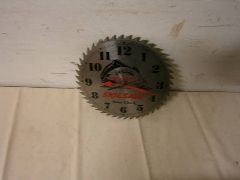 lot 193 image: Vintage Advertising Skilsaw Blade Clock