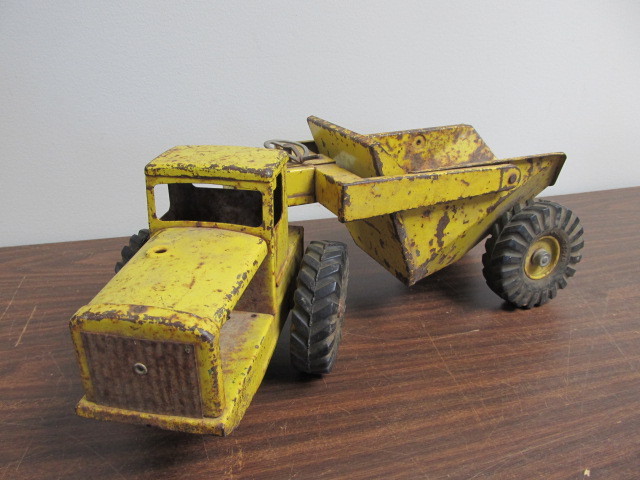lot 202 image: Vintage Pressed Steel Nylint Tournarocker