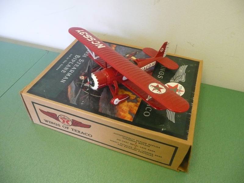 lot 25 image: WINGS OF TEXACO 1931 STEARMAN BIPLANE 3RD IN SERIES - DIE CAST COIN BANK - ERTL COLLECTIBLES 1995 - SEE PICTURES