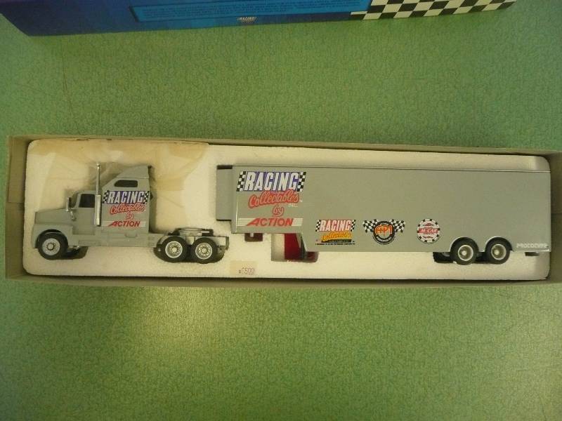 lot 36 image: 164 SCALE PLATINUM SERIES - RACE CAR TRANSPORTER - COLLECTIBLES BY ACTION - SEE PICTURES