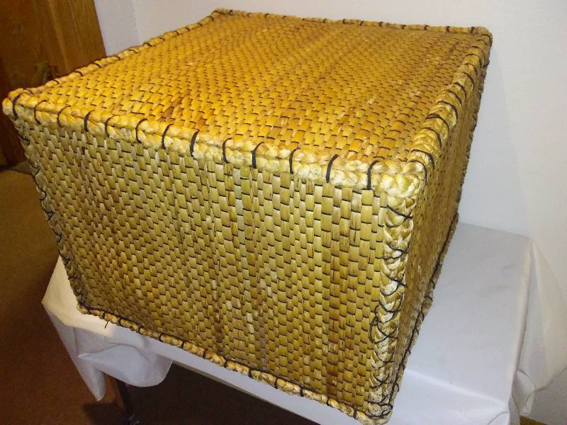 lot 69 image: Wicker Ottoman, end table or coffee table