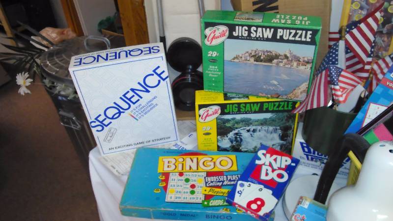 lot 19 image: Vintage lot of Fun Craft PaperSupplies, games, shuffle board,And more.