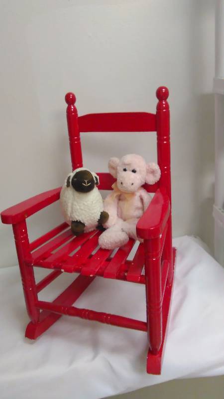 lot 42 image: Wooden Childs rocking chair