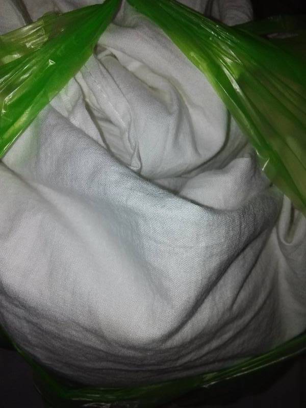 lot 57 image: White Muslin back drop 19 feet loooong.