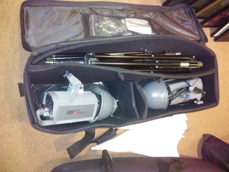 lot 88 image: Stand Alone Flash Strobes Interfit Stellar 600(2) Tri Pods (3), White Umbrellas (2) - untested